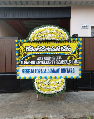 Papan Bunga Duka di Rambang Niru